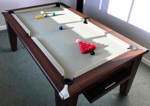 Classic  Pool Dining Table in a Dark Walnut Cabinet Finish
